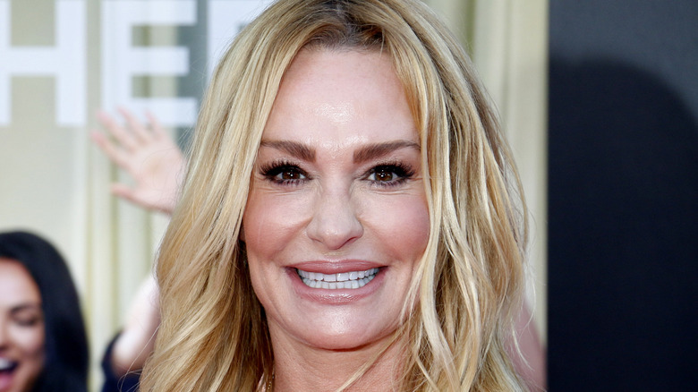 Taylor Armstrong souriant