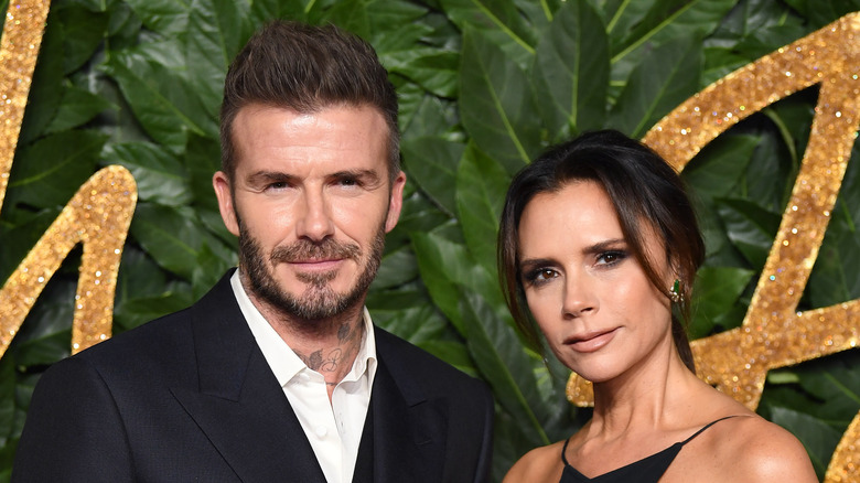 David Beckham et Victoria Beckham posant