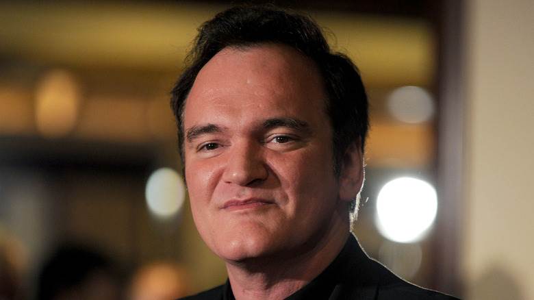 Quentin Tarantino posant pour les caméras